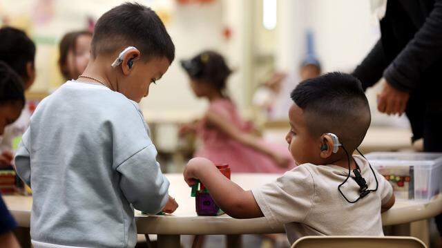 Jayden, 3, and Jacob, 3, play with blocks together on Thursday, March 5, 2026, at the Callier Center in Dallas.  The Callier Child Development Program serves kids who are deaf and hard of hearing. 